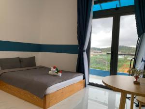 Postel nebo postele na pokoji v ubytování November Villa Đà Lạt
