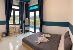 Postel nebo postele na pokoji v ubytování November Villa Đà Lạt + 37 fotografií