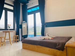 Postel nebo postele na pokoji v ubytování November Villa Đà Lạt