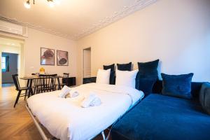 Ένα ή περισσότερα κρεβάτια σε δωμάτιο στο Luxury apartments in Paris Center