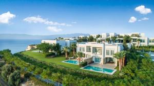 an aerial view of a villa with a swimming pool at Xanadu Island in Akyarlar