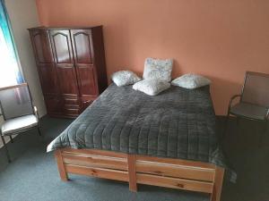 Postel nebo postele na pokoji v ubytování Apartmány Maksičky
