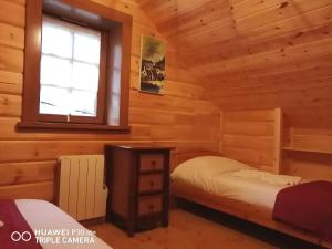 Postel nebo postele na pokoji v ubytování Refuges des Hauts