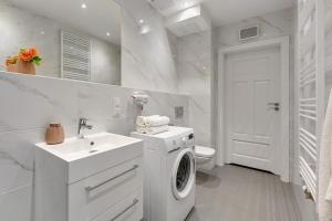 Kúpeľňa v ubytovaní Baltica Sky by TriApart + 16 fotografií