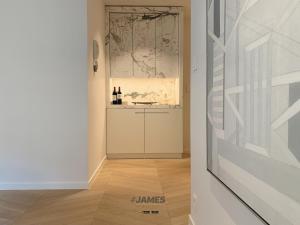 
A kitchen or kitchenette at Stunning, luxurious spacious design apartment ref J00720
