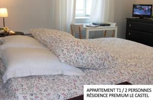 Postel nebo postele na pokoji v ubytování Coin d'Aubrac Hôtel Restaurant SPA de luxe
