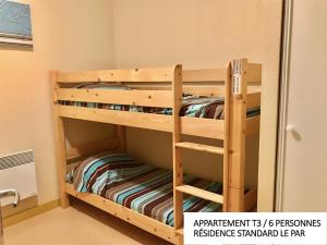 Postel nebo postele na pokoji v ubytování Coin d'Aubrac Hôtel Restaurant SPA de luxe