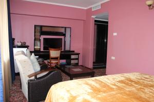Ένα ή περισσότερα κρεβάτια σε δωμάτιο στο Erebuni Hotel Yerevan