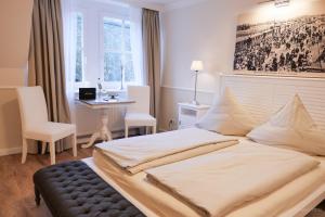 Postel nebo postele na pokoji v ubytování Hotel Hof Holm