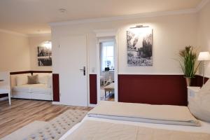 Postel nebo postele na pokoji v ubytování Hotel Hof Holm