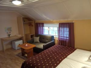 Postelja oz. postelje v sobi nastanitve Repo Hotel