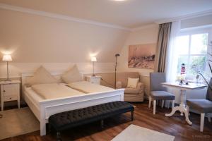 Postel nebo postele na pokoji v ubytování Hotel Hof Holm