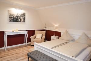 Postel nebo postele na pokoji v ubytování Hotel Hof Holm