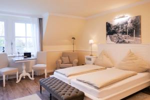 Postel nebo postele na pokoji v ubytování Hotel Hof Holm