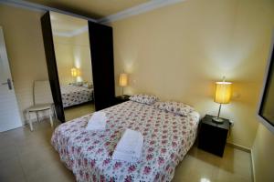 A bed or beds in a room at Villa Lovisi