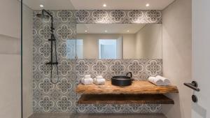 Uma casa de banho em Vila Marina by Sevencollection