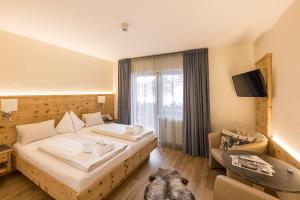 Posteľ alebo postele v izbe v ubytovaní Hotel Kornock