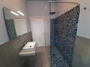 Kúpeľňa v ubytovaní Residenza dei Pini