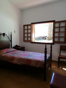 מיטה או מיטות בחדר ב-Castaño Bajo - Santa Brigida