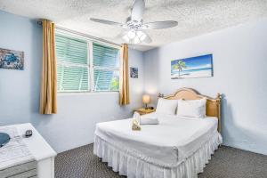 Krevet ili kreveti u jedinici u objektu Sunrise Suites - Sea Breeze Suite 101