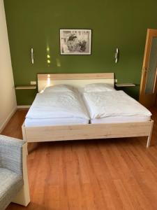 Postel nebo postele na pokoji v ubytování Steimke's Landhotel