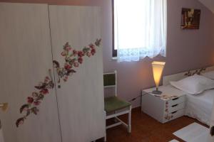 Postel nebo postele na pokoji v ubytování Apartments Petrada
