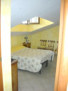 Letto o letti in una camera di One bedroom appartement with city view and terrace at Tuscania