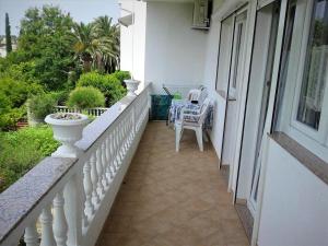 Balkón nebo terasa v ubytování Comfortable apartment with garden in Palit, 100 m², for 6 guests.