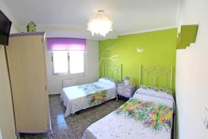 
Cama o camas de una habitación en 3 bedrooms appartement with city view balcony and wifi at Villena
