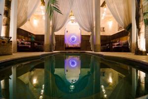 a house with a swimming pool with aented room with aented at 6 bedrooms villa with private pool jacuzzi and furnished terrace at Marrakech in Marrakesh