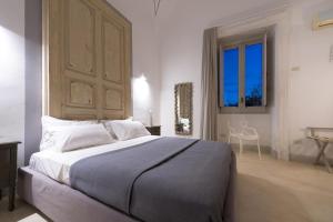 Een bed of bedden in een kamer bij 4 bedrooms appartement with furnished terrace and wifi at Sannicola 5 km away from the beach
