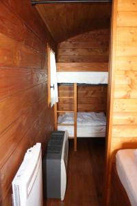 Postel nebo postele na pokoji v ubytování Charmant Studio à Villers sur Mer avec Jardin de 20 m²