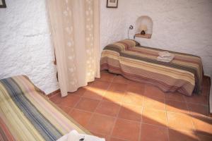 Posteľ alebo postele v izbe v ubytovaní Charming rental with shared pool in Gorafe