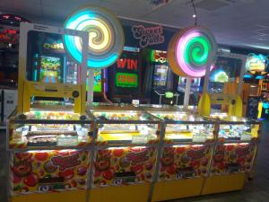 a pinball game in a store with arcade machines at 2013 Willerby Sunset Static Caravan Holiday Home in Clacton-on-Sea