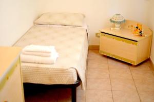 Ein Bett oder Betten in einem Zimmer der Unterkunft 2 bedrooms villa with shared pool furnished garden and wifi at Ragusa