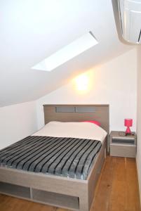 Postel nebo postele na pokoji v ubytování Maison chaleureuse à Bonifacio, 90 m², piscine partagée