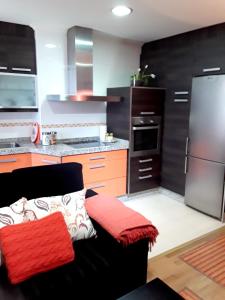 En TV eller et underholdningssystem på One bedroom appartement with wifi at Orense