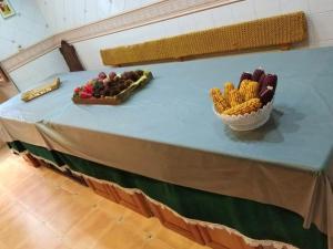 a blue table with a bowl of fruit on it at Spacious House with Mountain View in Carboeiro de Francia in Martije +22 photos