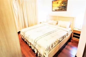 Postel nebo postele na pokoji v ubytování Boutique condo Pratumnak