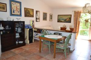 a dining room with a table and chairs at da lina in Porto Santo Stefano