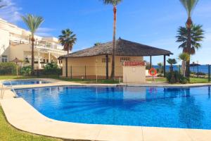 Bazén v ubytovaní PENTHOUSE BERMUDA BEACH 2 alebo v jeho blízkosti