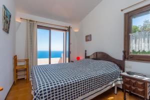 Posteľ alebo postele v izbe v ubytovaní ST-35 BEGUR Sa TUNA 4 PAX