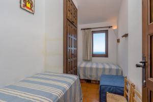 Posteľ alebo postele v izbe v ubytovaní ST-35 BEGUR Sa TUNA 4 PAX