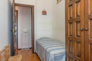 Posteľ alebo postele v izbe v ubytovaní ST-35 BEGUR Sa TUNA 4 PAX