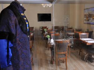 TV a/nebo společenská místnost v ubytování Divani Ali Hotel