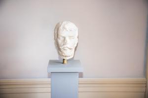 a bust of a man on a pedestal in a museum at Villa Prato-Lami in Casciana Terme