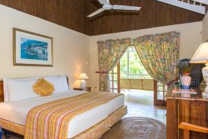 a bedroom with a bed and a window at Villa Viento in St Mary +66 photos