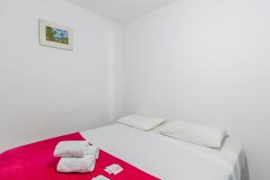 Tempat tidur dalam kamar di Club Suites - Aeroporto Congonhas