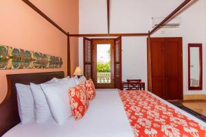 Ένα ή περισσότερα κρεβάτια σε δωμάτιο στο Hotel Quadrifolio