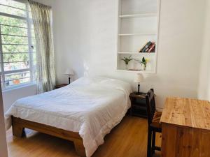 Letto o letti in una camera di Hostal Alcala